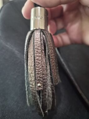 Franco Sarto Metallic Leather Tassel Charm